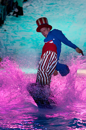 Students dress up in crazy costumes and ride down a snow caped hill on either skis, a snowboard or and airboard and skim a pool of water in Pond Skimming.
