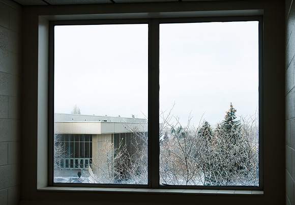 A frosty view of the John W. Hart Building from a warm room in the George S. Romney Building.