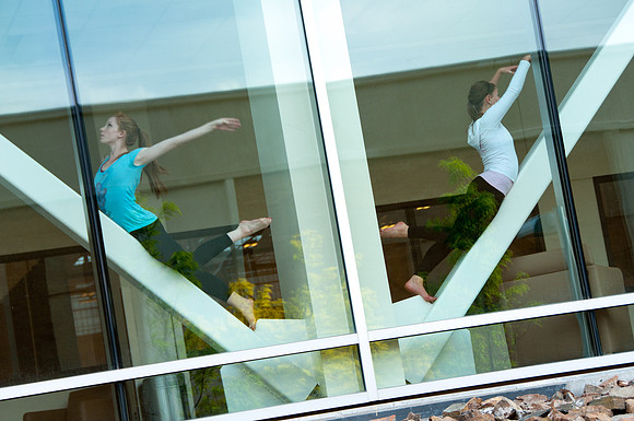 Interpretive dancers showcase their moves to classmates in the Manwaring Center Lobby.