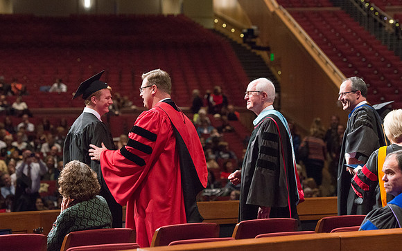 College of Agriculture and Life Sciences Convocation in the Byu-Idaho Center. Elder Wilson and President Clark along with College Dean, John Zenger congratulate the graduates.