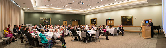 Online Leaning Graduates gather in the MC Special Events room for a reception.