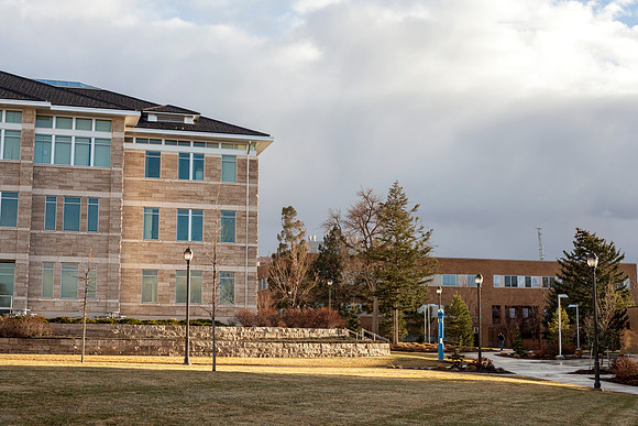 The Spori Building at sunset after a light rain on campus.