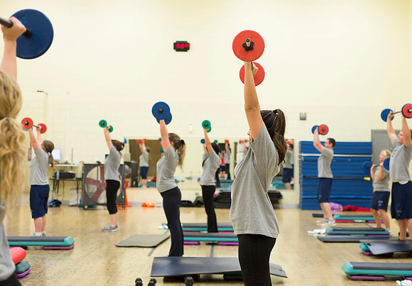 Students exercise in the Power Shred fitness class sponsored by the Wellness Center.