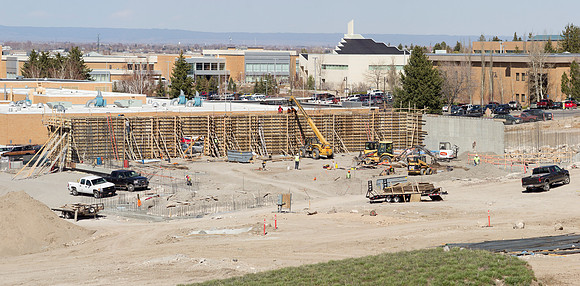 Workers construct the foundation for the new Science Building.
