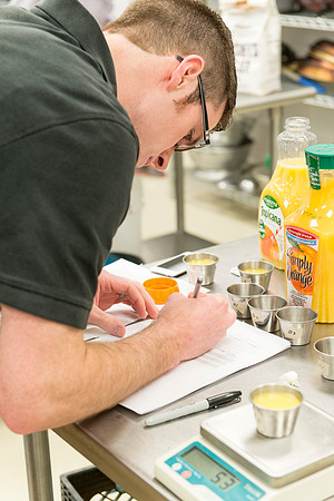 Students prepare food for taste testing in the Food Science Lab. This new major teaches students the science behind everyday foods. Instructors Neal Ricks and Kerry Huber.