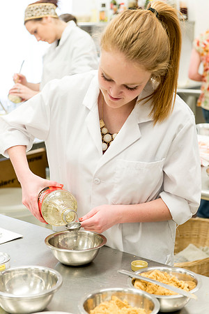 Students prepare food for taste testing in the Food Science Lab. This new major teaches students the science behind everyday foods. Instructors Neal Ricks and Kerry Huber.