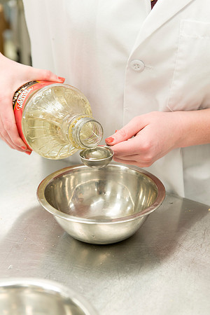 Students prepare food for taste testing in the Food Science Lab. This new major teaches students the science behind everyday foods. Instructors Neal Ricks and Kerry Huber.