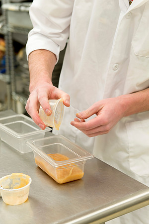 Students prepare food for taste testing in the Food Science Lab. This new major teaches students the science behind everyday foods. Instructors Neal Ricks and Kerry Huber.