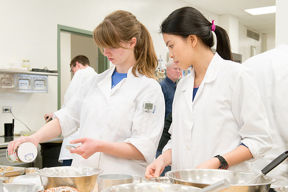 Students prepare food for taste testing in the Food Science Lab. This new major teaches students the science behind everyday foods. Instructors Neal Ricks and Kerry Huber.
