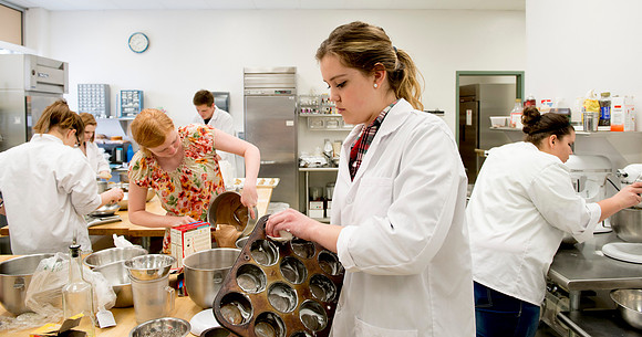 Students prepare food for taste testing in the Food Science Lab. This new major teaches students the science behind everyday foods. Instructors Neal Ricks and Kerry Huber.