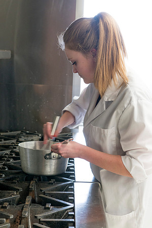 Students prepare food for taste testing in the Food Science Lab. This new major teaches students the science behind everyday foods. Instructors Neal Ricks and Kerry Huber.