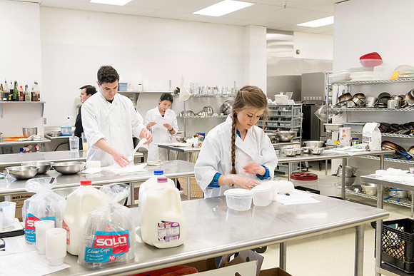 Students prepare food for taste testing in the Food Science Lab. This new major teaches students the science behind everyday foods. Instructors Neal Ricks and Kerry Huber.