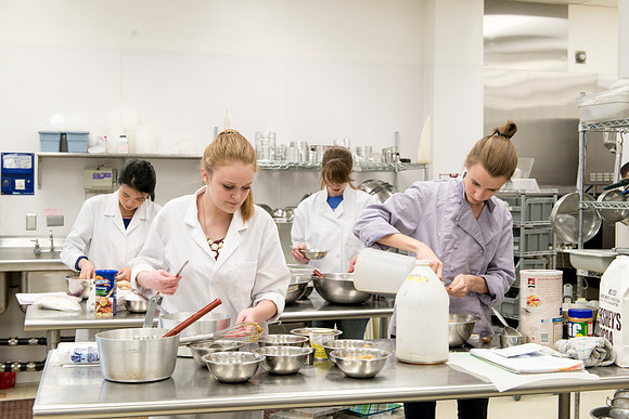 Students prepare food for taste testing in the Food Science Lab. This new major teaches students the science behind everyday foods. Instructors Neal Ricks and Kerry Huber.