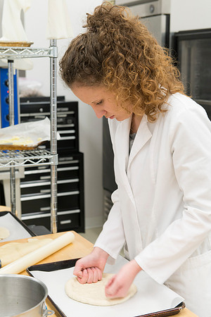 Students prepare food for taste testing in the Food Science Lab. This new major teaches students the science behind everyday foods. Instructors Neal Ricks and Kerry Huber.