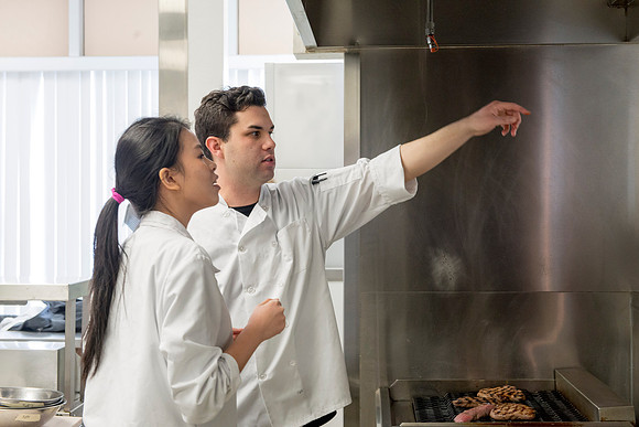 Students prepare food for taste testing in the Food Science Lab. This new major teaches students the science behind everyday foods. Instructors Neal Ricks and Kerry Huber.