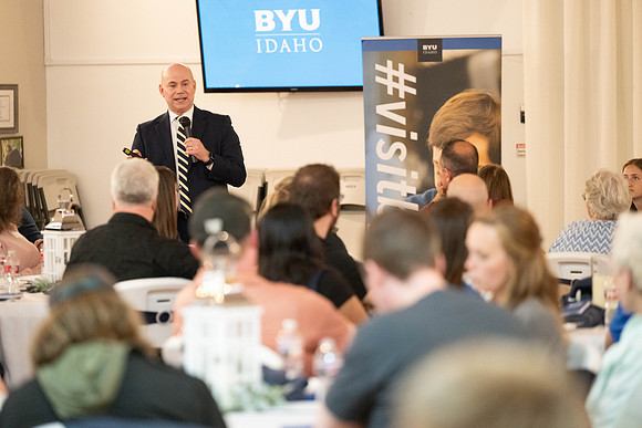 Alumni in the Cache Valley area gather at Eagles Landing Event Center, in Smithfield, Utah and get the chance to listen to and meet President Meredith.