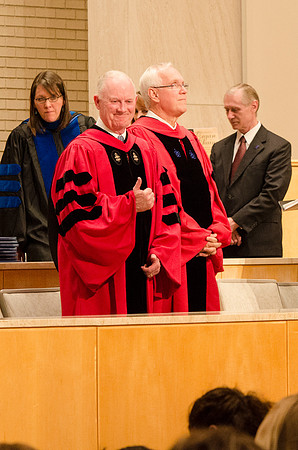 President Kim B. Clark gives a thumbs up to someone in the crowd. Photo by Erik Hill.