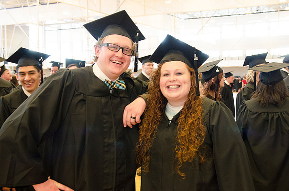 Graduates Brad Ziegler and Kaylee Brickey wait for the Processional to begin. Photo by Erik Hill.