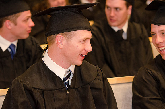 Graduates chat together waiting for Convocation to begin. Photo by Erik Hill.