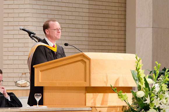 Eric B. Karl, Dean of the College of Physical Science and Engineering speaks to graduates at the conclusion of the Convocation ceremony. Photo by Erik Hill.