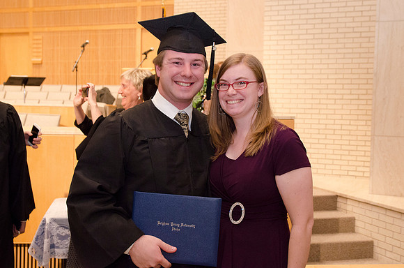Graduate James Fish and his wife Heather pose for a picture after the Convocation Ceremony. Photo by Erik Hill.