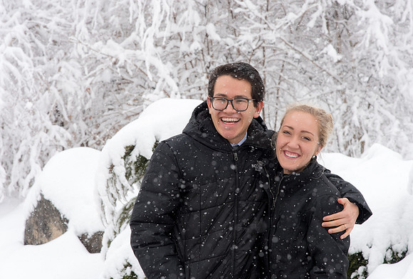 BYU-Idaho campus becomes a Winter Wonderland on graduation day. Carlos and Elizabeth Palomares stroll through the gardens.