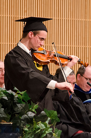 Paul Powell performs a violin solo, "If You Could Hie to Kolob" arranged by Mark Newman. Photo by Erik Hill.