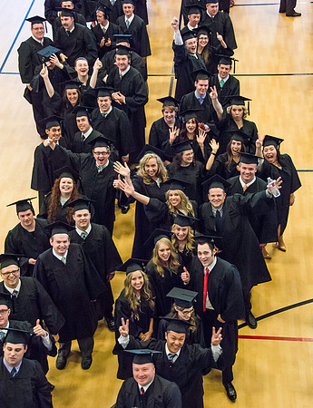 Graduates line up in the BYU-Idaho Center courts before the processional begins for Graduation at BYU-Idaho.