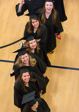 Graduates line up in the BYU-Idaho Center courts before the processional begins for Graduation at BYU-Idaho.