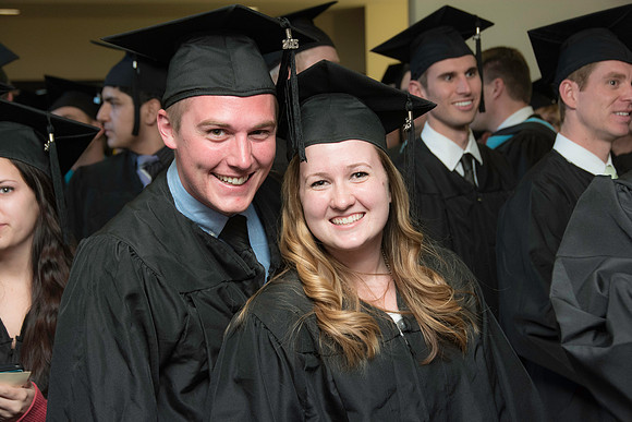 Graduates march in during the processional at the beginning of Graduation at BYU-Idaho.