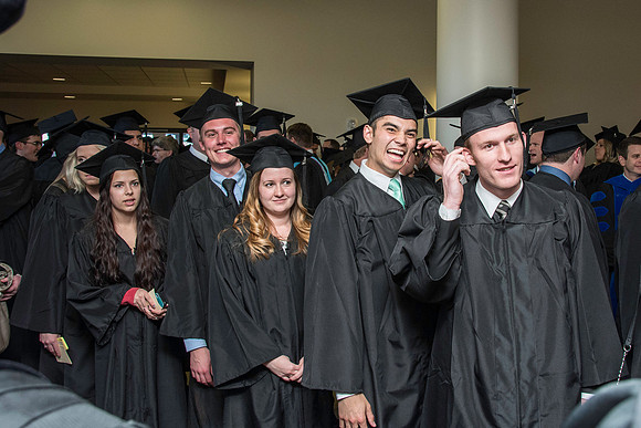 Graduates march in during the processional at the beginning of Graduation at BYU-Idaho.