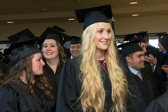 Graduates march in during the processional at the beginning of Graduation at BYU-Idaho.