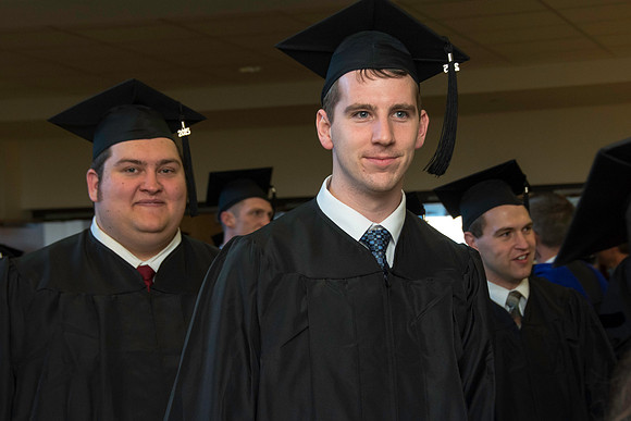 Graduates march in during the processional at the beginning of Graduation at BYU-Idaho.