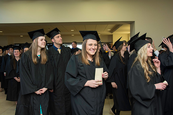 Graduates march in during the processional at the beginning of Graduation at BYU-Idaho.