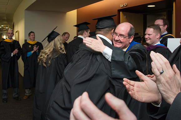 Graduates march in during the processional at the beginning of Graduation at BYU-Idaho.
