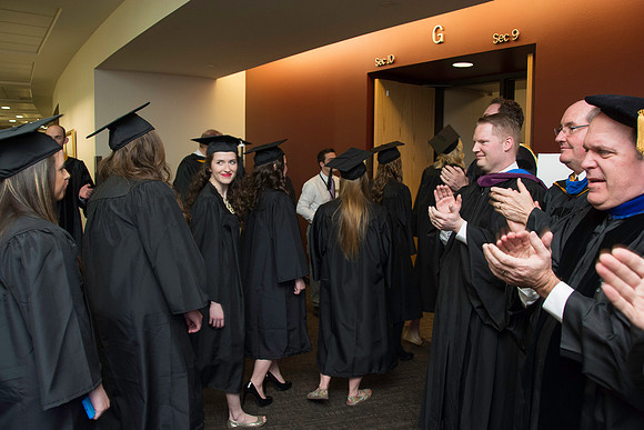 Graduates march in during the processional at the beginning of Graduation at BYU-Idaho.