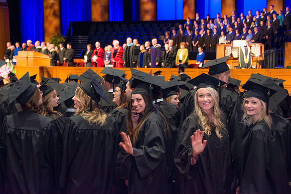 Graduates march in during the processional at the beginning of Graduation at BYU-Idaho.