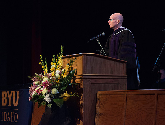 Vice President, Henry J. Eyring, speaks to graduates of Interdisciplinary Studies during convocation in the Kirkham auditorium at BYU-Idaho.