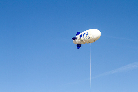 A BYU-Idaho Balloon flies high in the air for April Graduation.