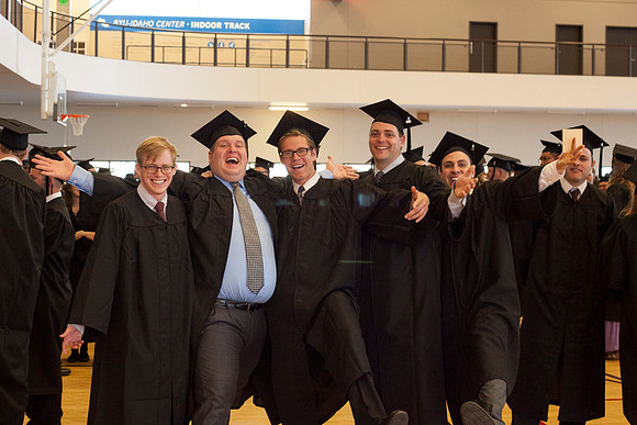 Graduates cheerfully celebrate in the I-Center before the Commencement Ceremony begins.