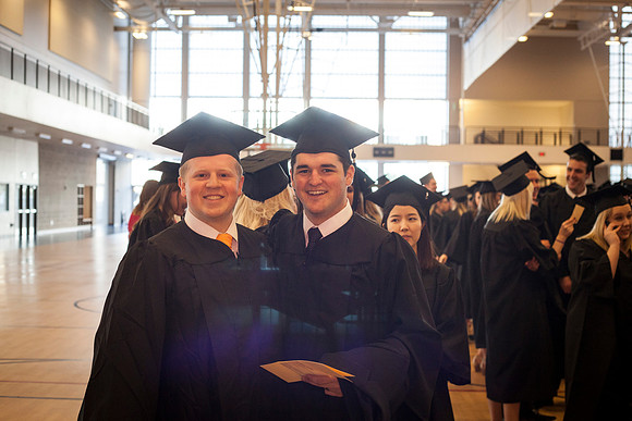 Graduates gather in the I-Center before the Commencement Ceremony begins. Photo by Tyler D. Rickenbach