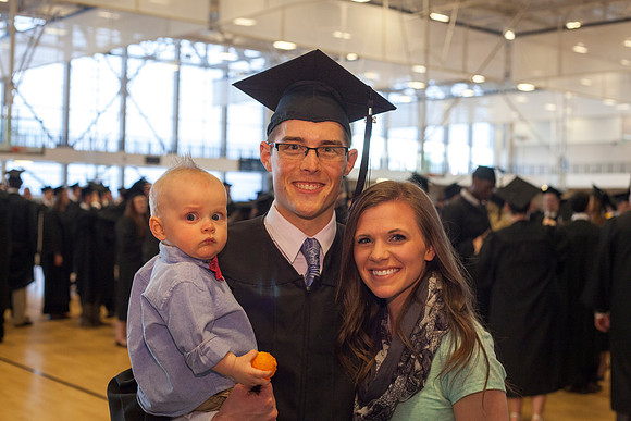 Graduates gather in the I-Center before the Commencement Ceremony begins. Photo by Tyler D. Rickenbach