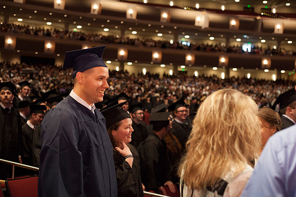 Student gather in the I-Center for the April Commencement Ceremony to listen to inspiring remarks from President Clark and Elder Robert C. Gay.