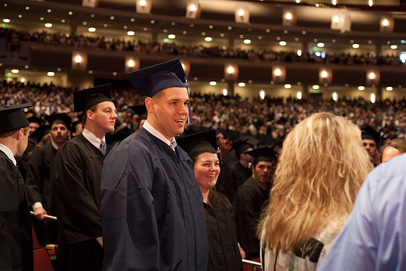 Student gather in the I-Center for the April Commencement Ceremony to listen to inspiring remarks from President Clark and Elder Robert C. Gay.