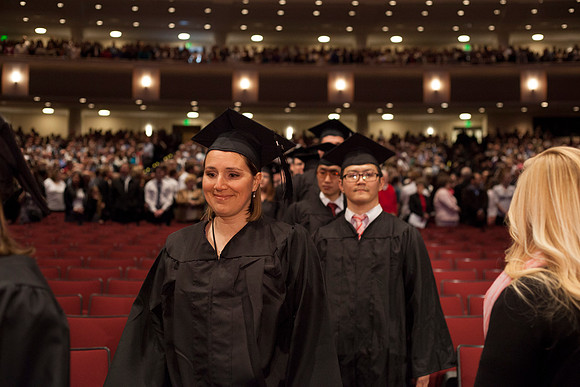 Student gather in the I-Center for the April Commencement Ceremony to listen to inspiring remarks from President Clark and Elder Robert C. Gay.