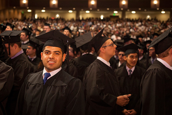 Student gather in the I-Center for the April Commencement Ceremony to listen to inspiring remarks from President Clark and Elder Robert C. Gay.
