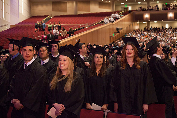 Students gather in the BYU-Idaho Center just before Commencement begins. Photo by Tyler Rickenbach