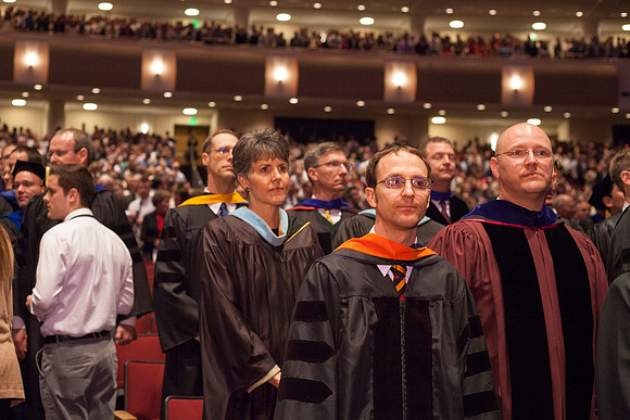 Students gather in the BYU-Idaho Center just before Commencement begins. Photo by Tyler Rickenbach