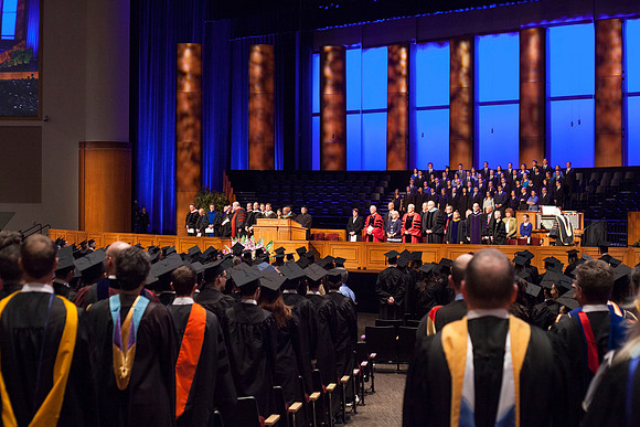 Faculty and graduates gather in the I-Center for the April Commencement Ceremony.
