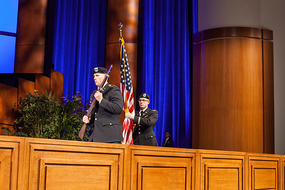 BYU-Idaho Army ROTC Cadet Flanigan and 2nd LT Bowler prepare to post the colors in the I-Center before the Commencement Ceremony begins.